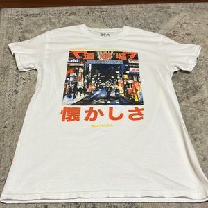 T-shirt for all to wear. Gently used looks good.